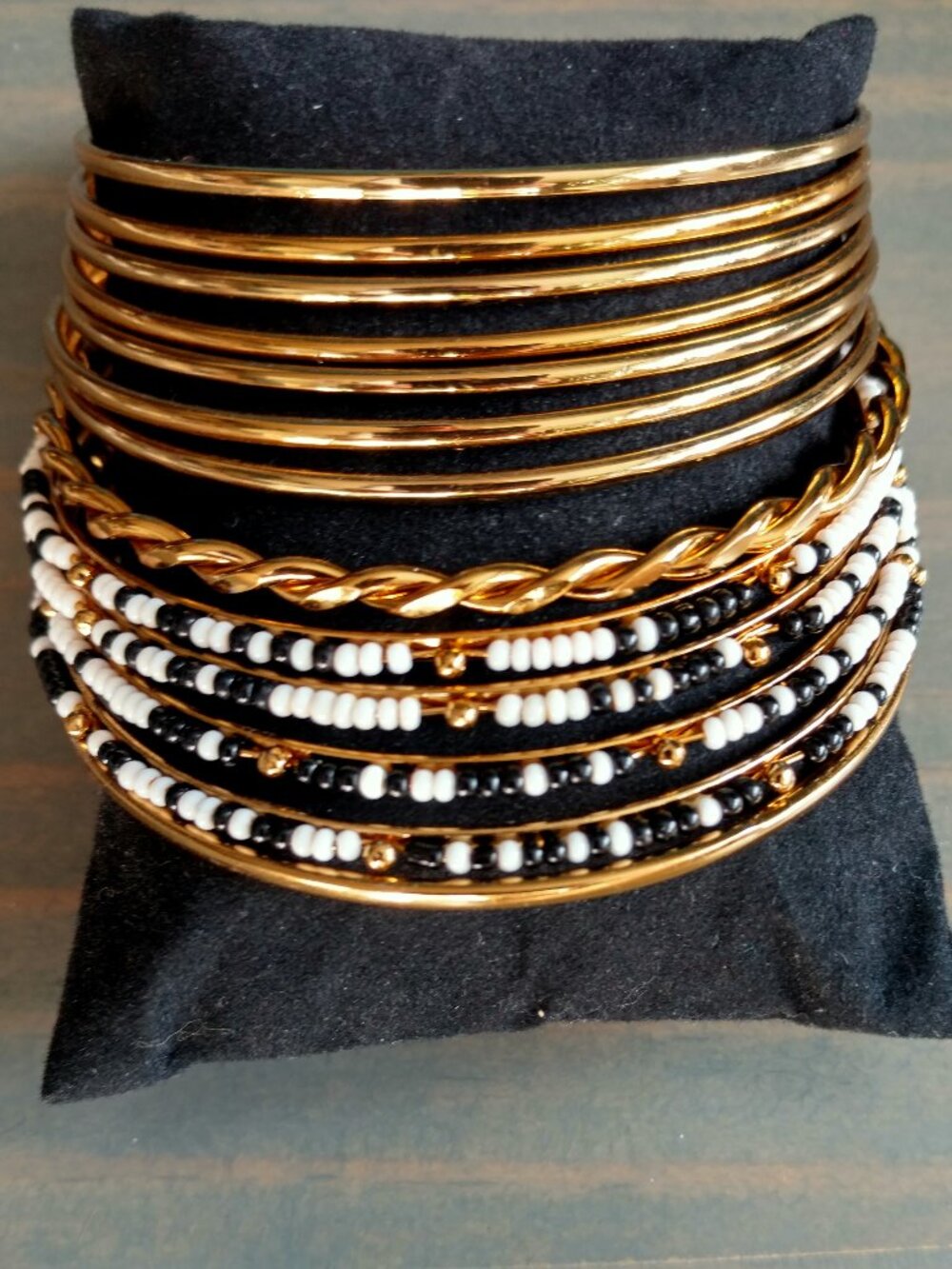 Gold, black and white bangle set